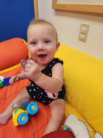 child playing with a toy