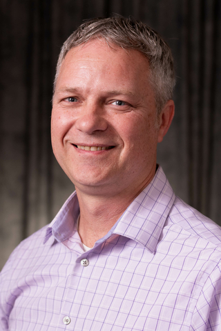 Layne Morsch head and shoulders photo in button-down shirt