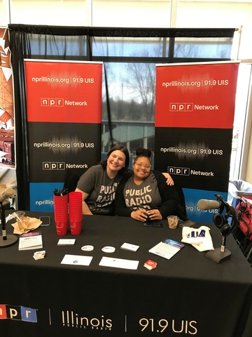 staff at table at fundraising event