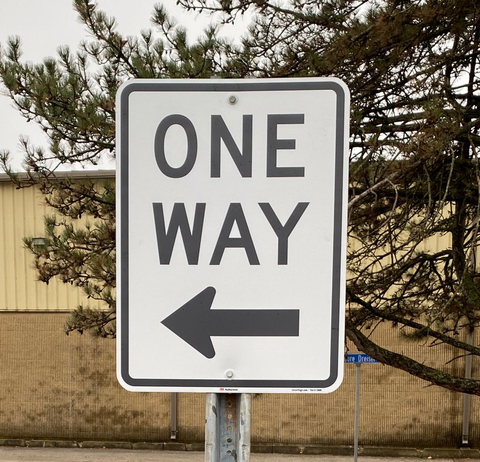 One way directional road sign