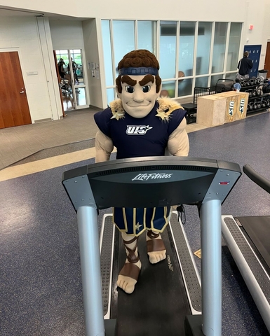 Orion mascot walking on treadmill in TRAC