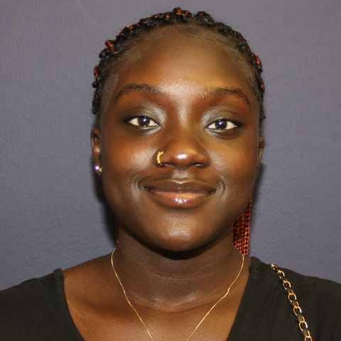 Staff photo of Sainey Drammeh. Smiling female student. 