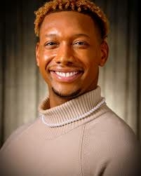 Professional headshot of Dr. Steven Johnson, Jr. wearing a beige sweater.