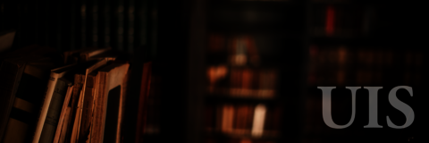 An old library with books on the shelf.