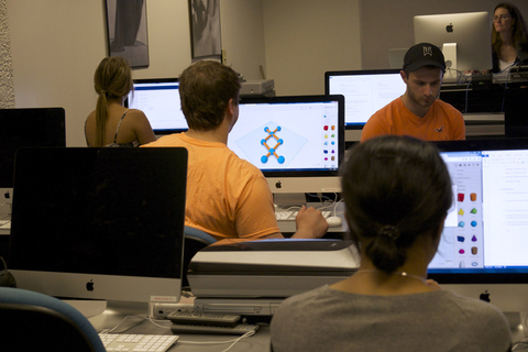 Students creating 3D models on the computer for printing