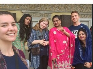 Alex in India with a group of friends