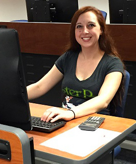young woman at a desk computer