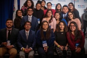Hispanic/Latinx students posing for a group photo
