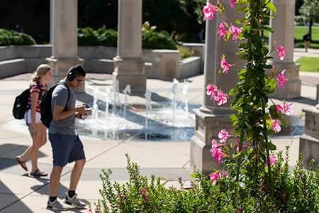 Students walking by the UIS Colonnade