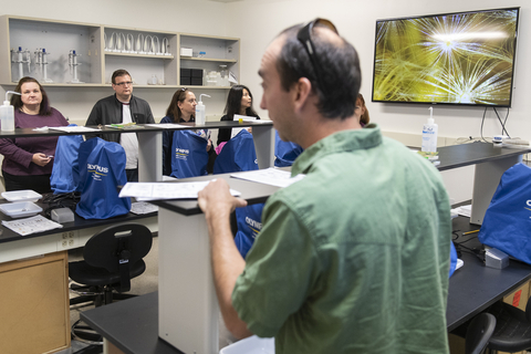 UIS employees learning to test water samples