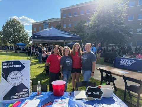 Student leadership team hosting a table at UIS Involvement Expo