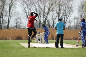 players performing cricket at UIS