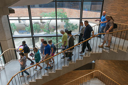 students walking down the stairs of Brookens Library