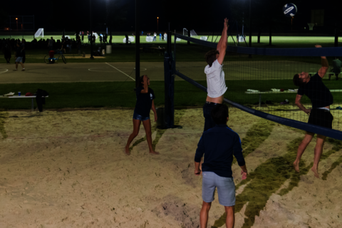 students playing sand volleyball at Rec Park