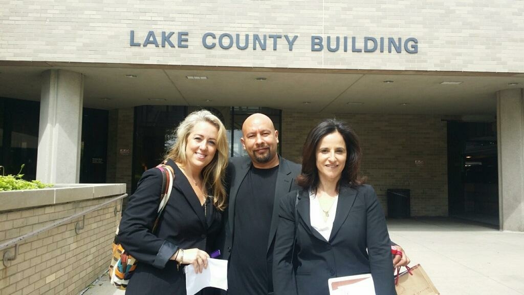 Angel Gonzalez with Lauren Kaeseberg, IIP staff attorney and Vanessa Potkin, senior staff attorney, Innocence Project, after receiving his Certificate Of Innocence in June 2015.