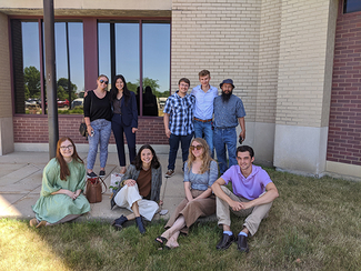 llinois Innocence Project staff, interns and volunteers await the release  of client Jennifer McMullen. 