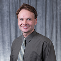 A headshot of Brian Clevenger 
