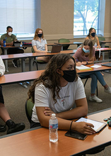 students in class with masks