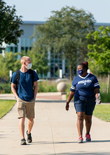 students walking on campus