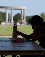 Student studies on quad