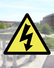 Power outage symbol over campus shot