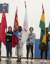 Students holding flags at the International Festival