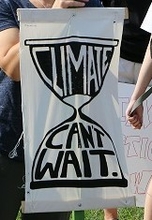 Dr. Brandon Derman and Dr. Megan Styles, Environemtnal Studies faculty, at a climate protest on the Quad in 2019