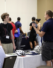Student meeting with staff