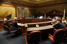 Photo of Former Governors Jim Edgar and Pat Quinn meeting with FY2022 ILSIP Cohort during their seminar.