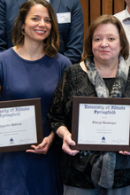 Drs. Bolivar and Reminger with their awards