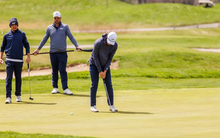 Julien Babineau golfing in gray and blue UIS gear