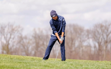 Sacha Lamraski golfing in blue UIS outfit