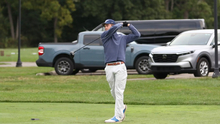 Brooks Cluver golfing in UIS blue