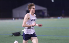 Ryan Kris running outdoor track