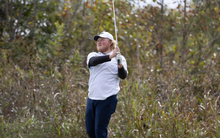 Peyton Woods golfing