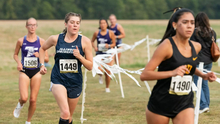 Alli Thompson running UIS xc