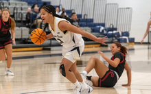 Kayla Rice coming off a steal in basketball game