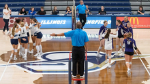 UIS Volleyball and opponent on UIS court