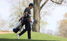 Sahachat "Chevy" Noosong walking the golf course