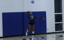 Erica Sledge serving