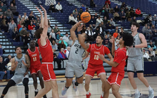 Jordan Rice playing basketball at UIS