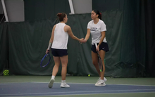 Cristina Mendoza Romero and Jane Carter playing tennis