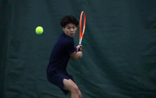 Lin En Tan playing tennis at UIS