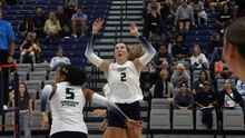 Madi Siefken setting for UIS volleyball