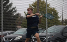 Luke Pennington playing tennis for UIS