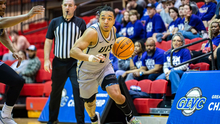 Jordan Rice playing basketball at UIS