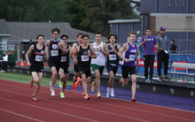 Chase Cooley in a pack of runners in 1500 meter outdoor track race