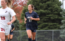 Abbie Gleason playing soccer