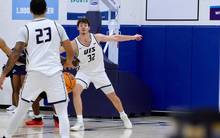 Alex Stell playing basketball at UIS