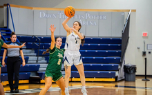 Kennedy Osterman playing basketball